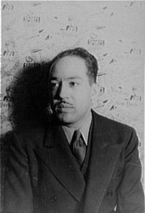 Langston Hughes photographed by Carl Van Vechten, 1936. From the collection of the Library of Congress and in the public domain. Image copied from Wikimedia commons (©Wikimedia) 